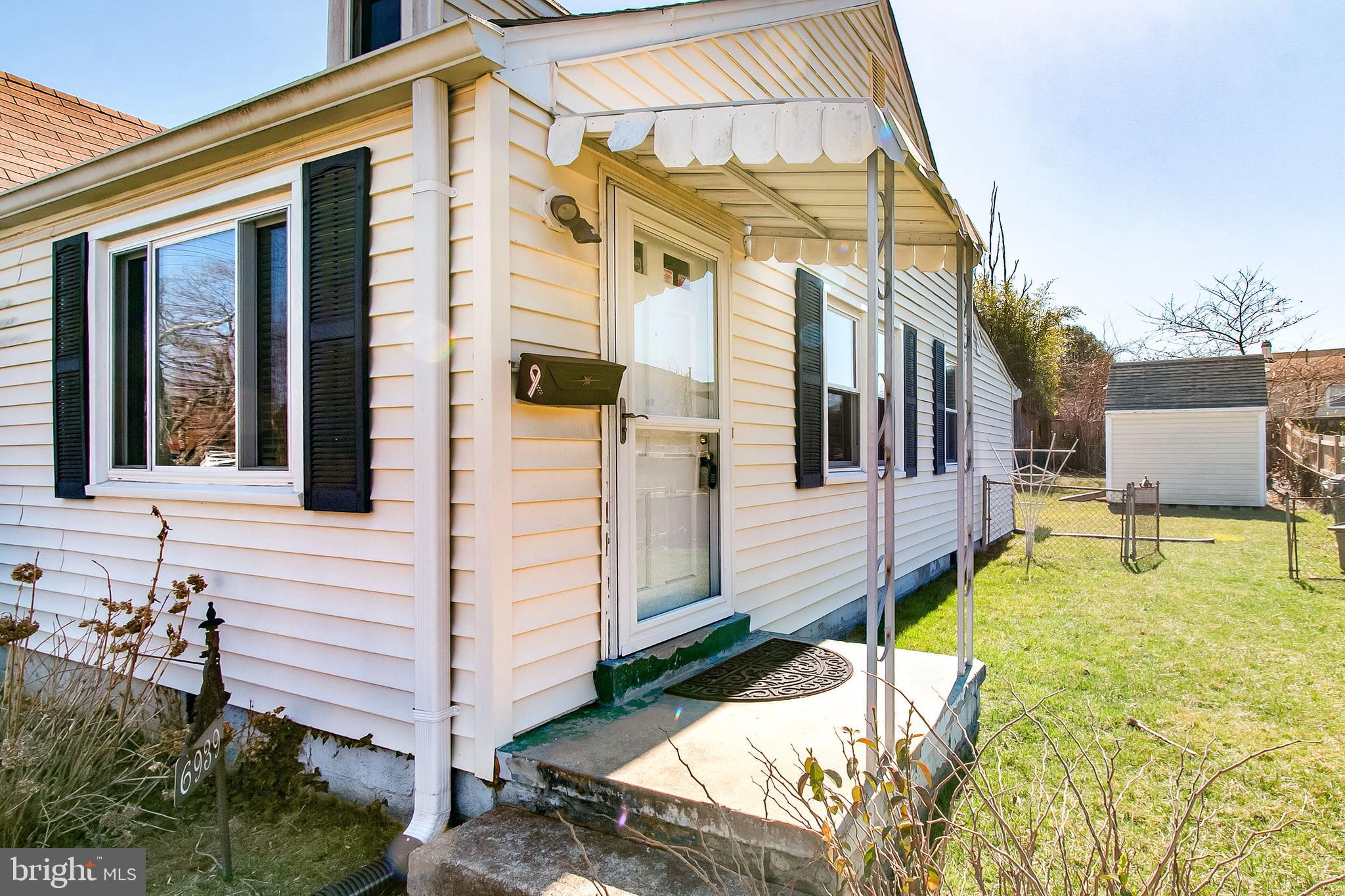 6939 Weston Road Falls Church, VA 22042 - Photo 4 of 25 a view of a house with a yard