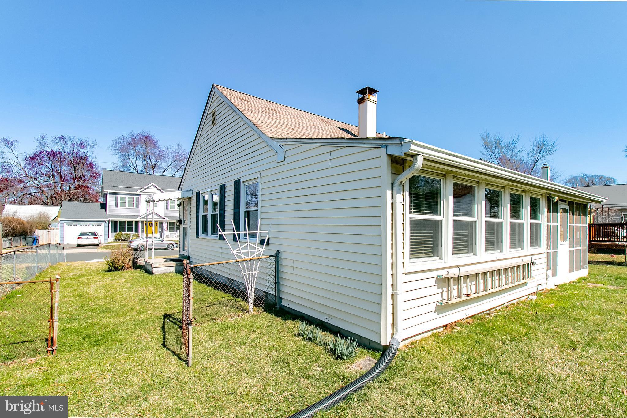 6939 Weston Road Falls Church, VA 22042 - Photo 6 of 25 a view of a house with backyard and sitting area