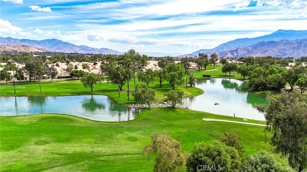762 Torrey Pines Road Banning, CA 92220 - Photo 2 of 43 a view of a lake with a mountain in the background