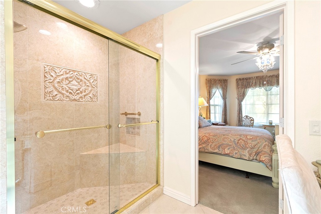 762 Torrey Pines Road Banning, CA 92220 - Photo 25 of 43 a en suite bathroom with a shower and a sink