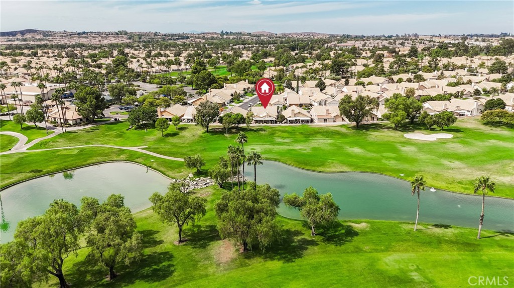 762 Torrey Pines Road Banning, CA 92220 - Photo 6 of 43 a view of a golf course with a lake