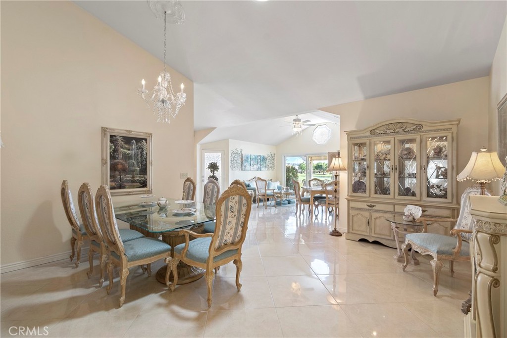 762 Torrey Pines Road Banning, CA 92220 - Photo 10 of 43 a view of a dining room with furniture and chandelier