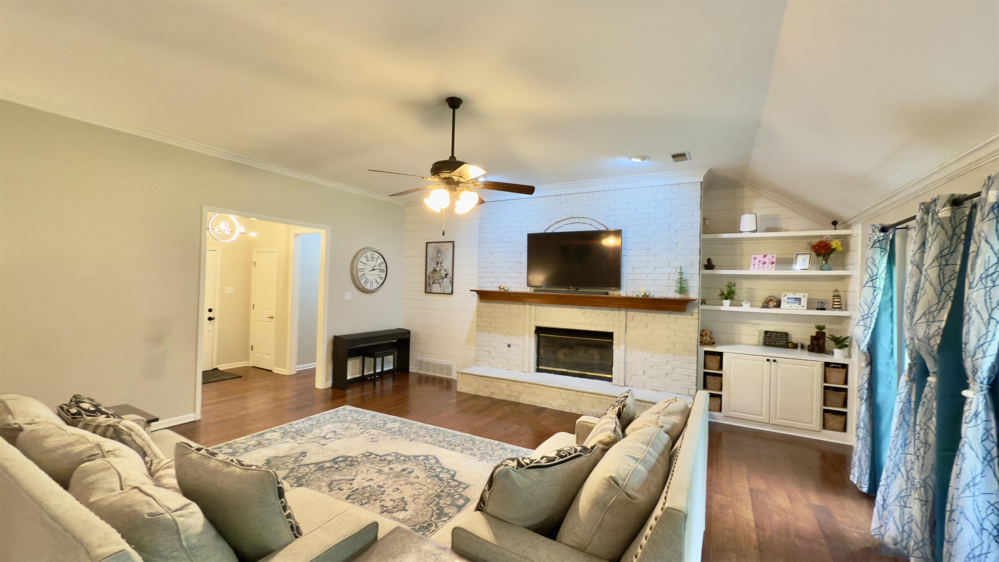 1082 Sugar Lane Collierville, TN 38017 - Photo 6 of 25 a living room with furniture fireplace and flat screen tv