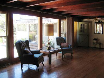 314 Del Norte Road Ojai, CA 93023 - Photo 3 of 8 Large picture windows let in lots of light and views of the back yard