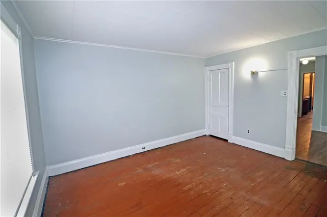 an empty room with a door