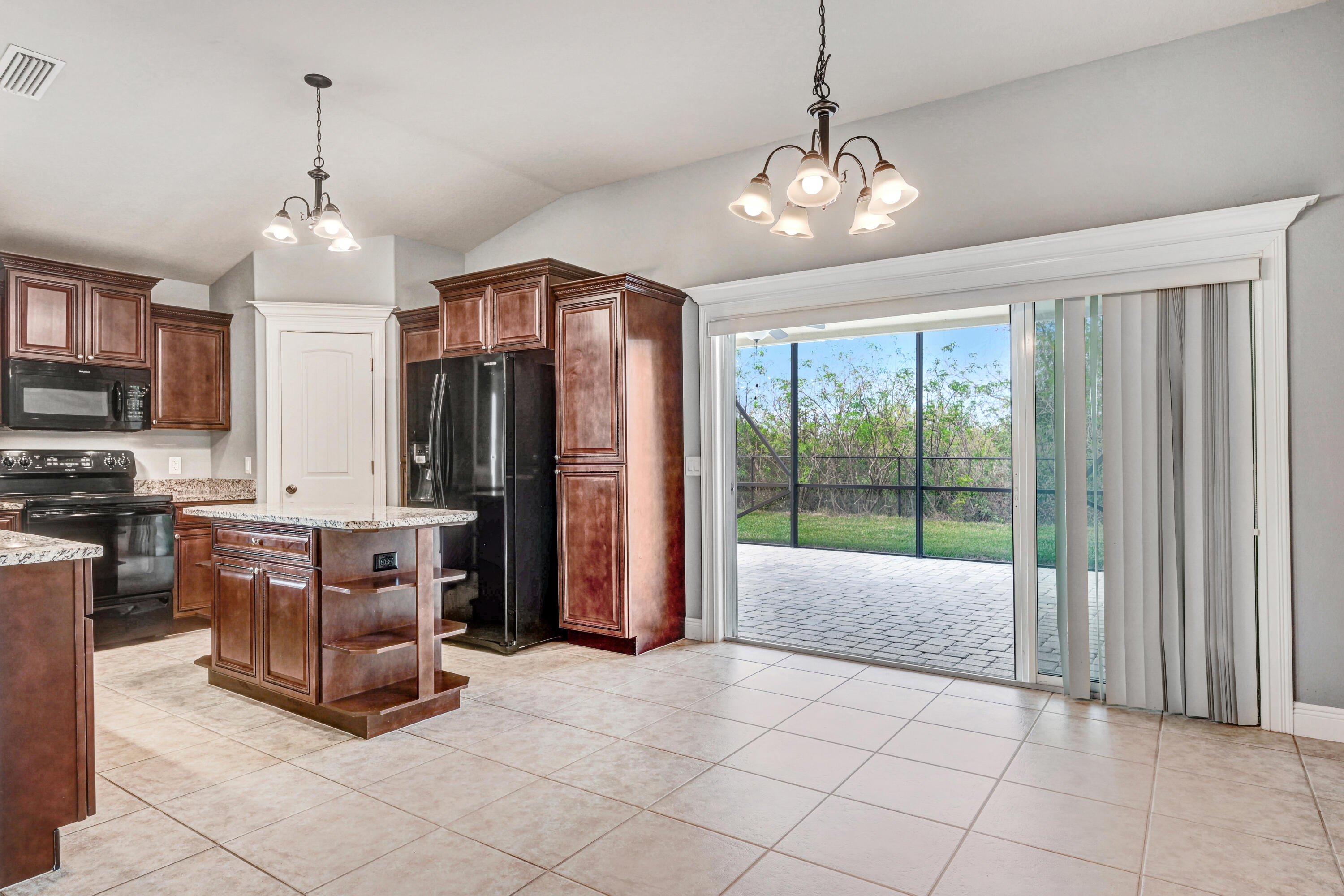 3901 Brantley Circle Rockledge, FL 32955 - Photo 20 of 33 a living room with furniture and large windows