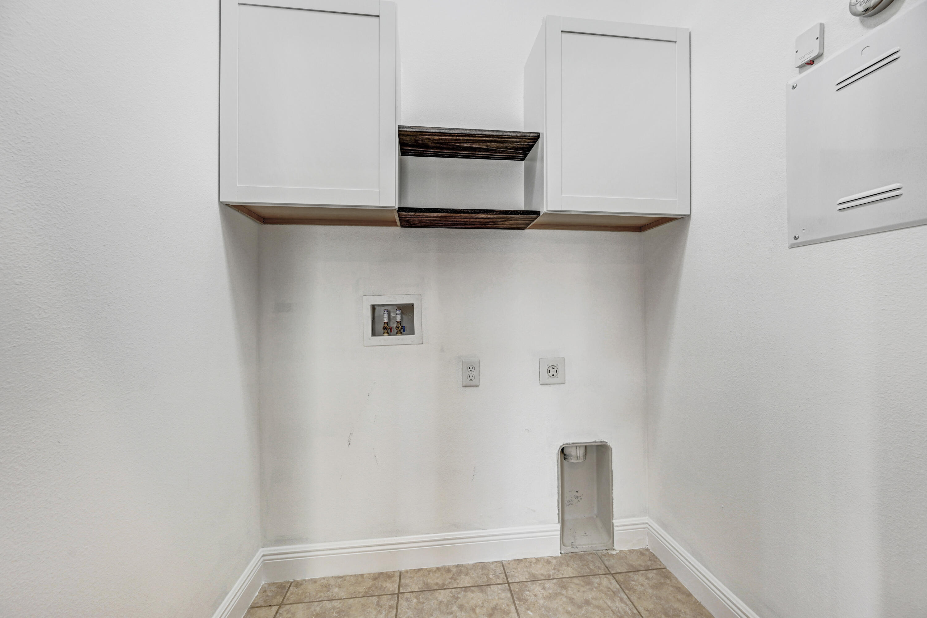 3901 Brantley Circle Rockledge, FL 32955 - Photo 23 of 33 a view of cupboard