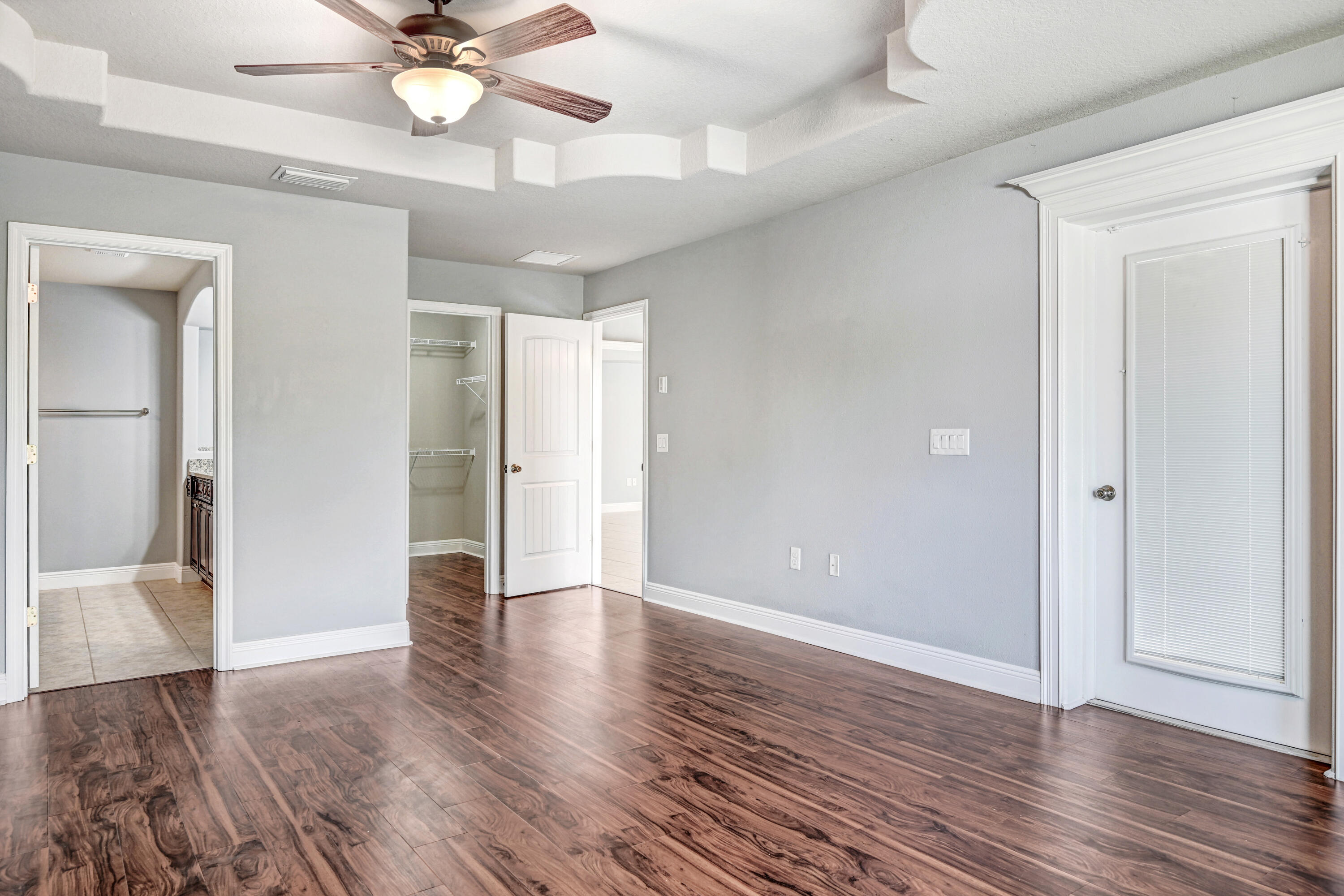 3901 Brantley Circle Rockledge, FL 32955 - Photo 29 of 33 a view of an empty room with wooden floor