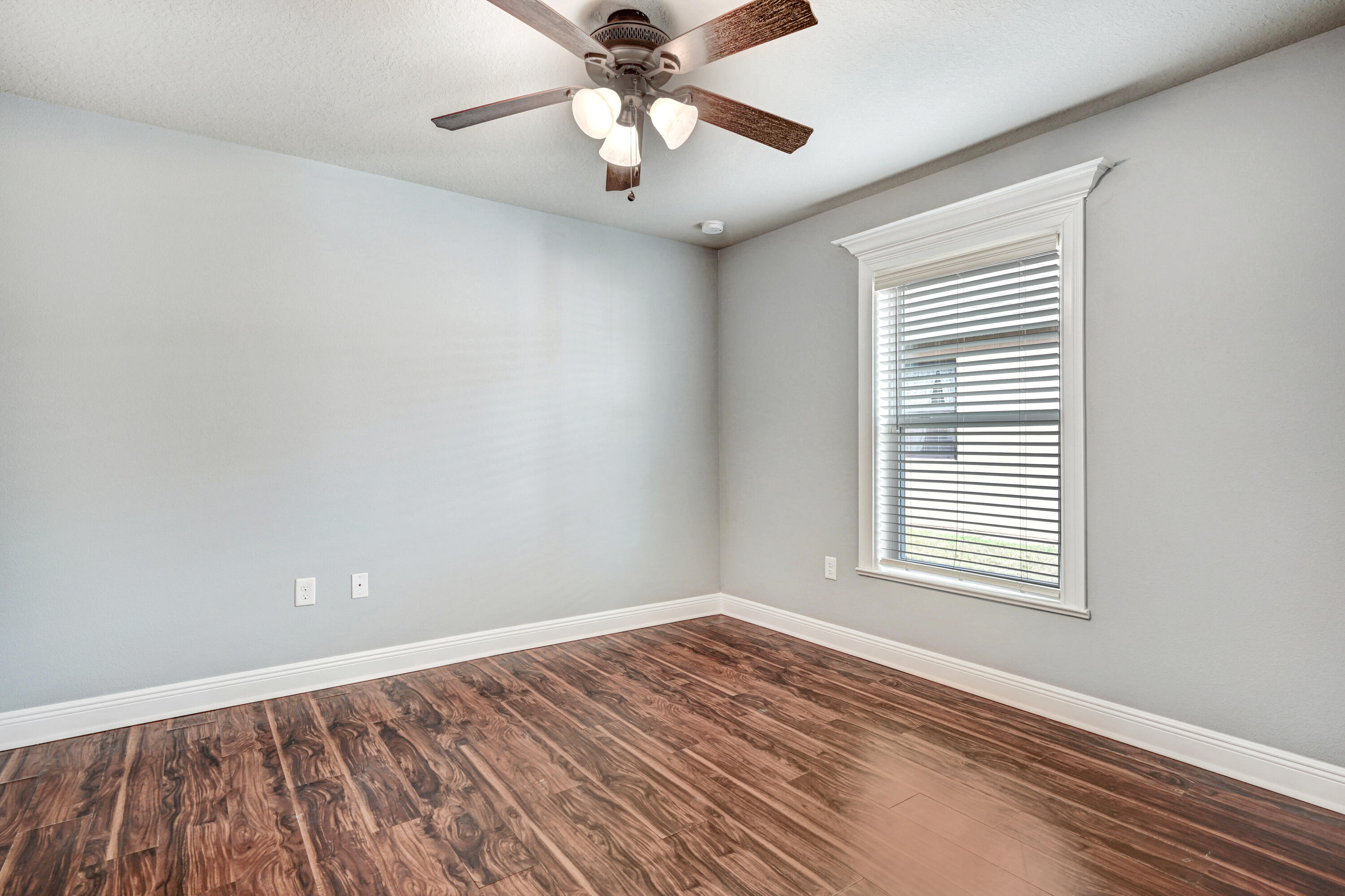 3901 Brantley Circle Rockledge, FL 32955 - Photo 33 of 33 wooden floor in an empty room with a window