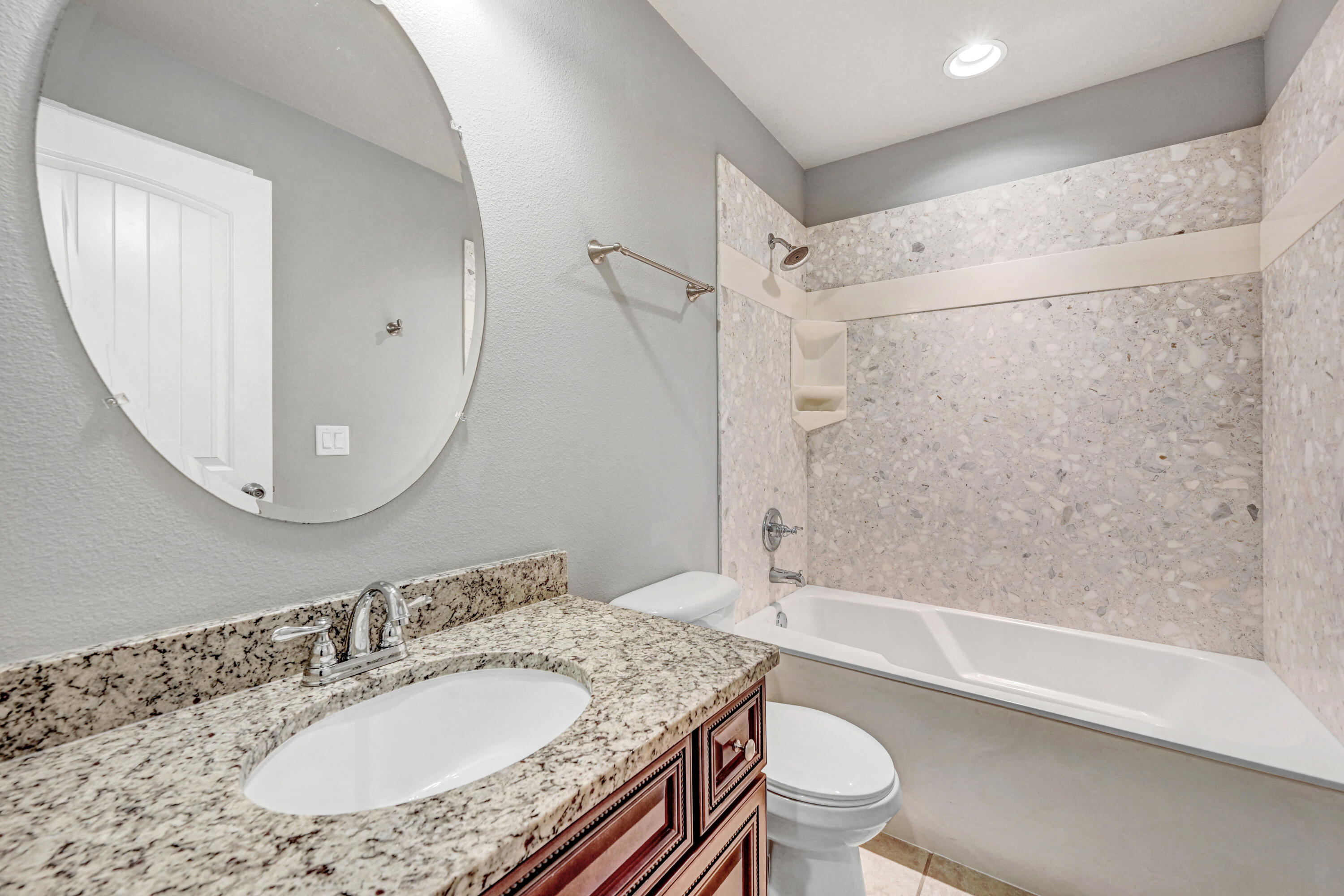 3901 Brantley Circle Rockledge, FL 32955 - Photo 7 of 33 a bathroom with a granite countertop sink toilet and shower