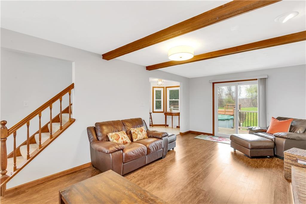 226 Rizzi Drive Irwin, PA 15642 - Photo 12 of 43 Open to the Entry and Kitchen with Slider to Rear Deck.