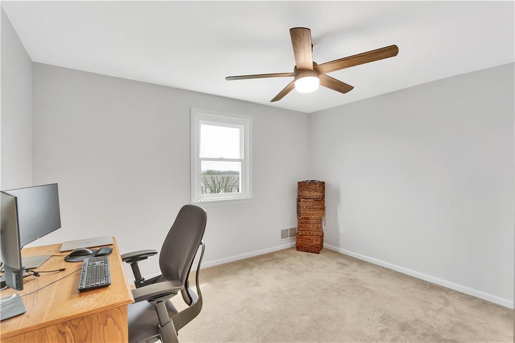 226 Rizzi Drive Irwin, PA 15642 - Photo 35 of 43 Front Facing, 12x11 Bedroom #4 with Ceiling Fan, Fresh Paint and Neutral Carpet.