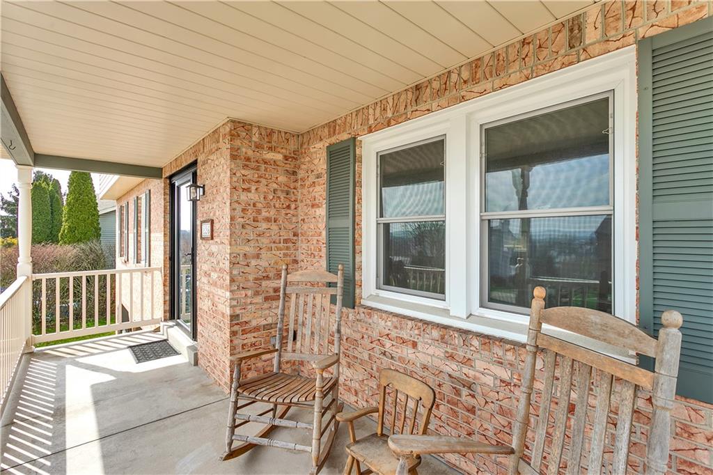 226 Rizzi Drive Irwin, PA 15642 - Photo 8 of 43 Covered Front Porch / Patio - The Perfect Place to Relax with Morning Coffee.