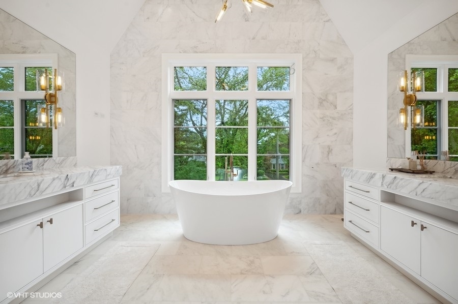 844 Prospect Avenue Winnetka, IL 60093 - Photo 16 of 27 a large white bathroom with a granite countertop sink and a large window