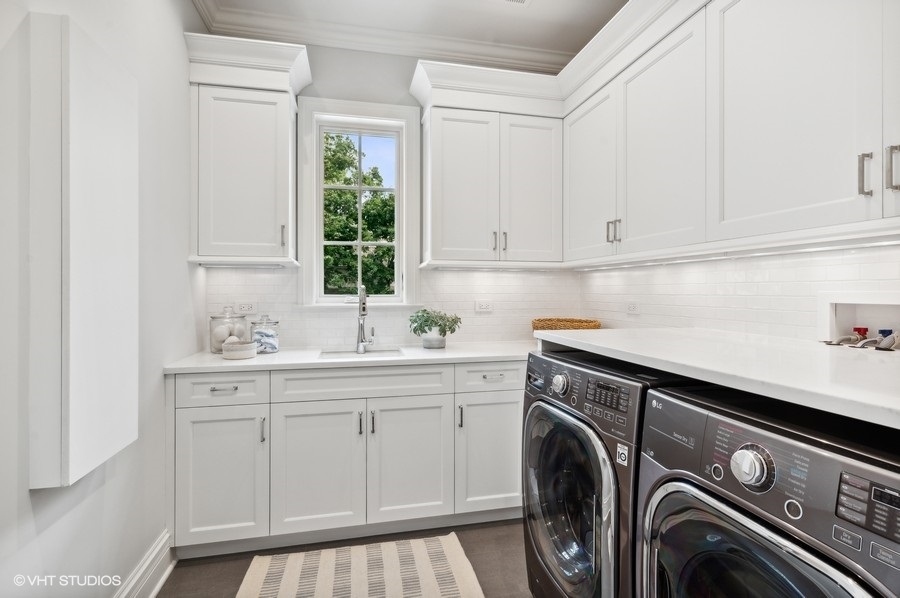 844 Prospect Avenue Winnetka, IL 60093 - Photo 19 of 27 a utility room with sink dryer and washer