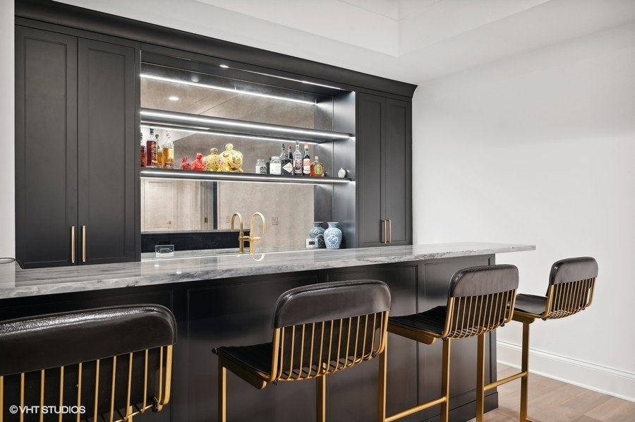 844 Prospect Avenue Winnetka, IL 60093 - Photo 21 of 27 a kitchen with a sink and a refrigerator