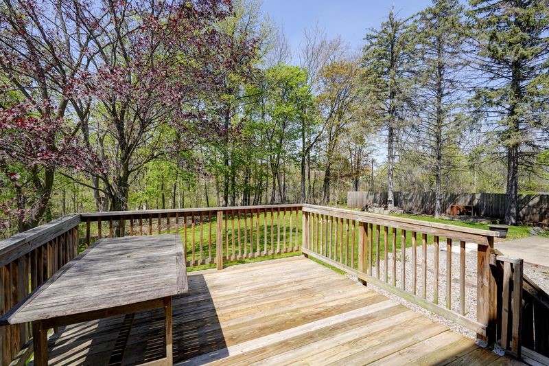 44 Latchmere Drive Victor, NY 14564 - Photo 39 of 50 VIEW LOOKING OUT TO THE DECK FROM THE DINETTE.