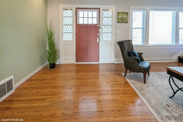a view of a livingroom with furniture and windows
