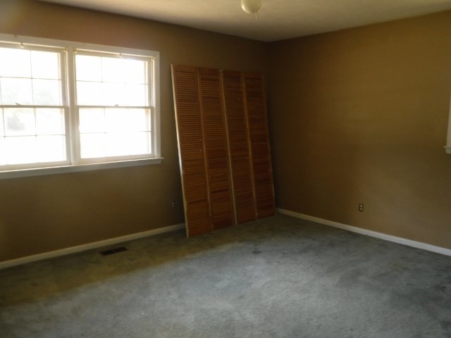 1511 Kingston Road Perry, GA 31069 - Photo 11 of 13 an empty room with a empty space and a window
