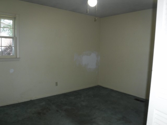 1511 Kingston Road Perry, GA 31069 - Photo 12 of 13 an empty room with a window