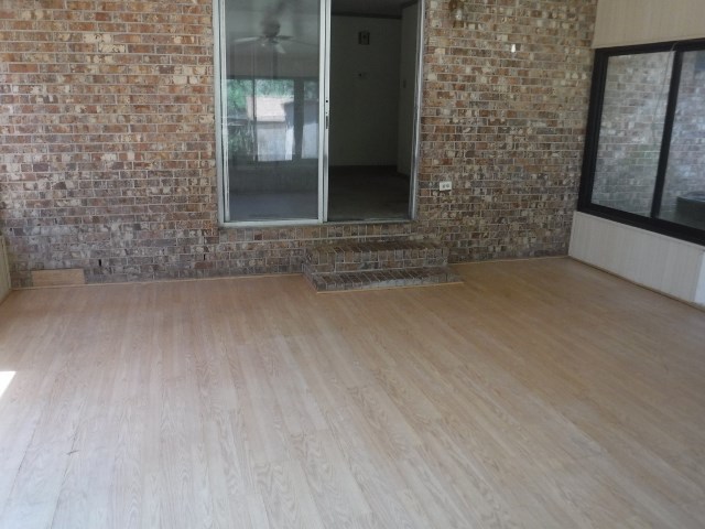 1511 Kingston Road Perry, GA 31069 - Photo 5 of 13 a view of a brick house with a large window
