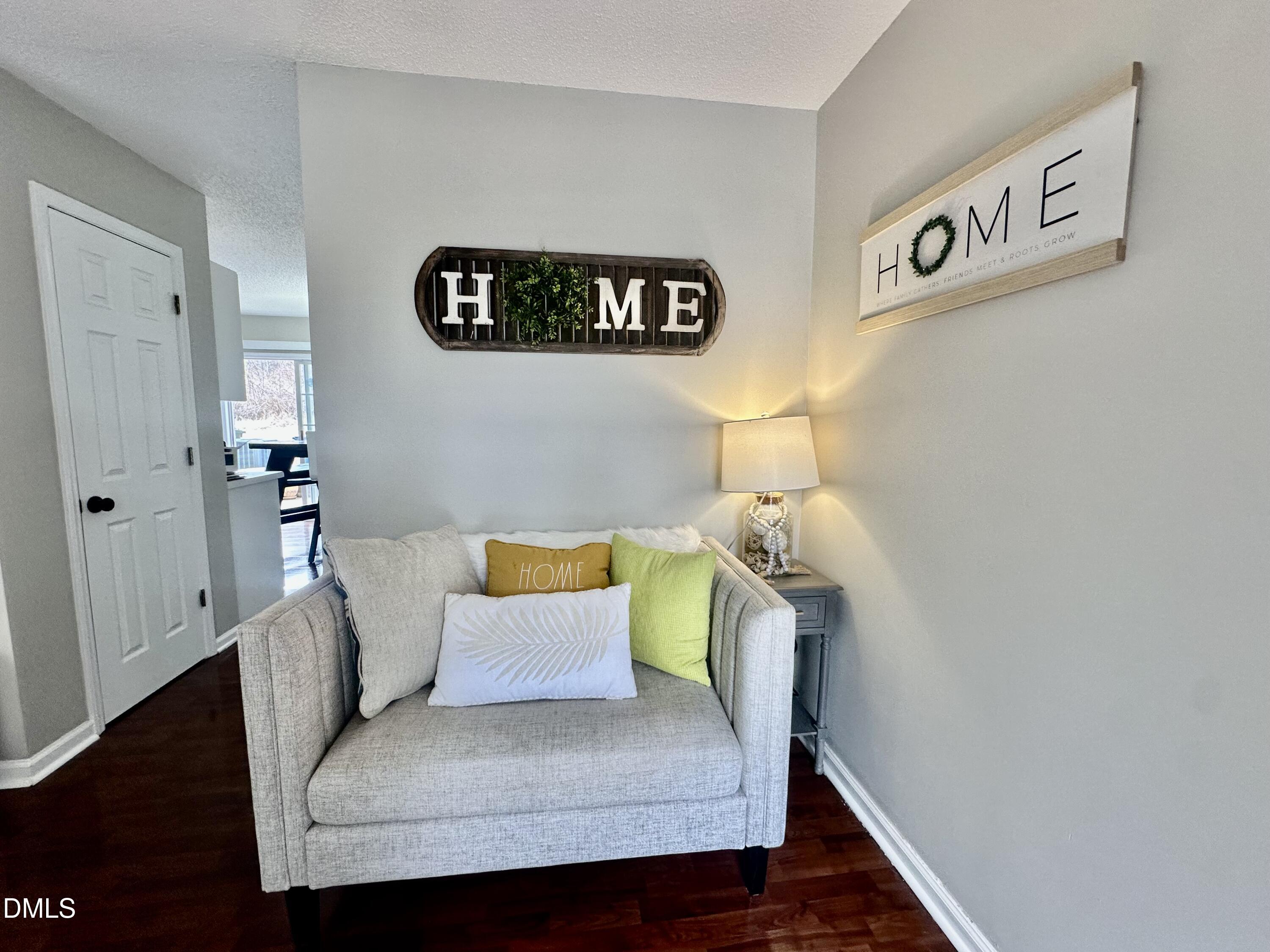 2106 Walnut Bluffs Lane Raleigh, NC 27610 - Photo 3 of 15 a bedroom with a bed and a table
