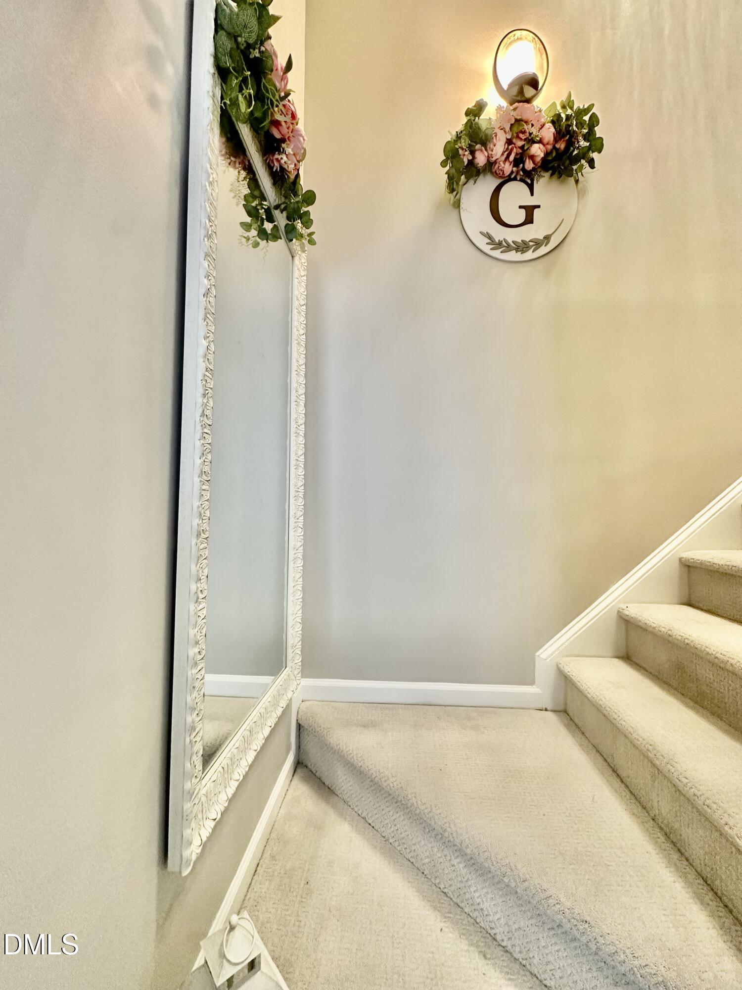 2106 Walnut Bluffs Lane Raleigh, NC 27610 - Photo 5 of 15 a bathroom with a granite countertop sink and a mirror