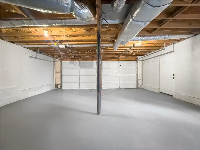 a view of a house with a tree