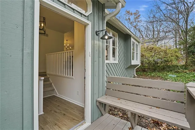 a view of a two chairs on the deck