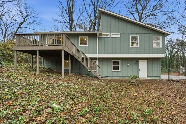 a house with trees in front of it