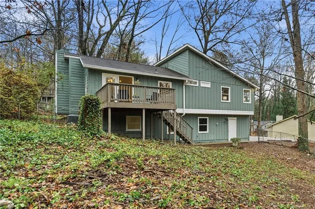 a backyard of a house with lots of green space