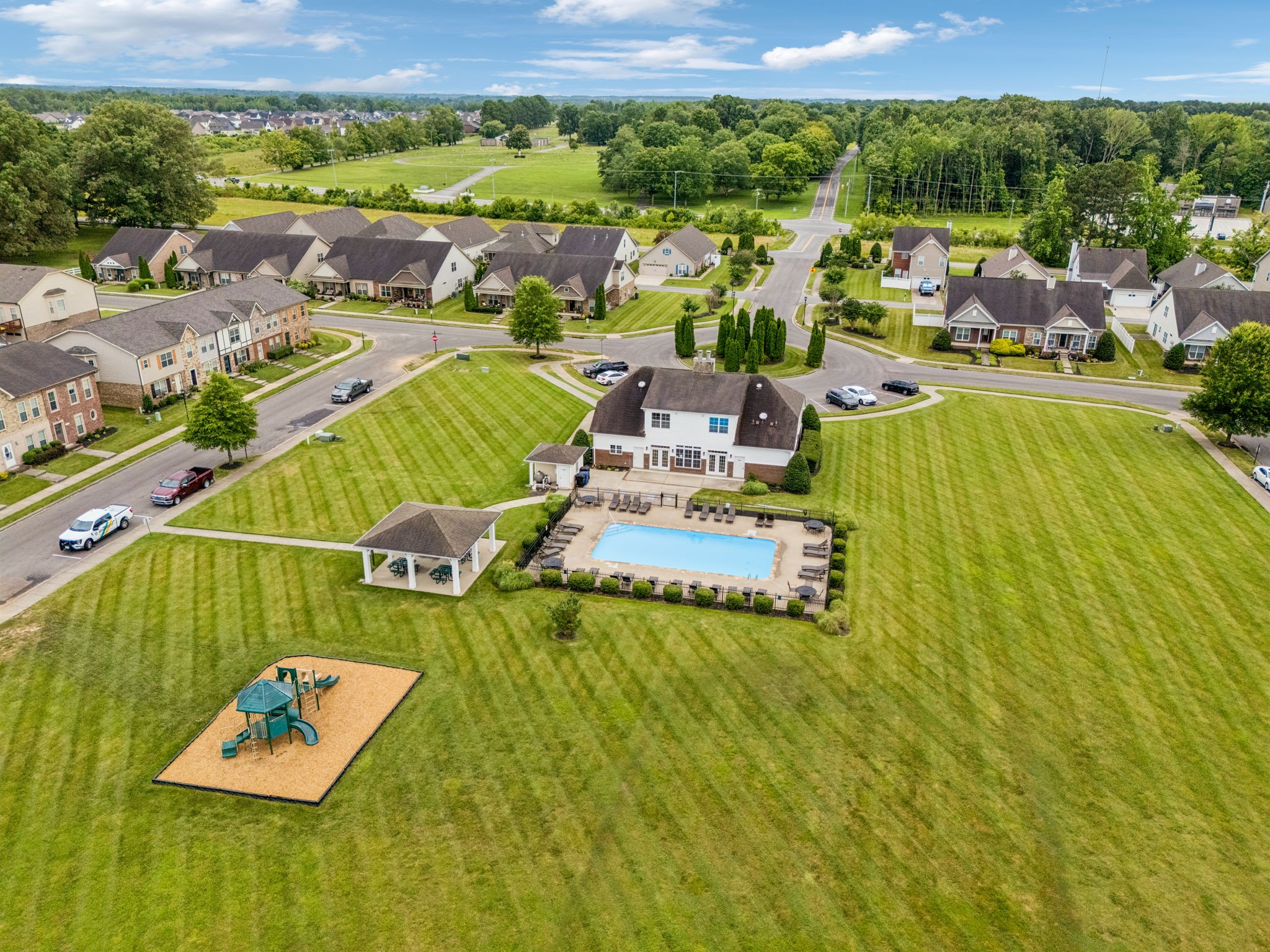 188 Whitman Alley Clarksville, TN 37043 - Photo 21 of 28 a view of a swimming pool with lawn chairs and couches