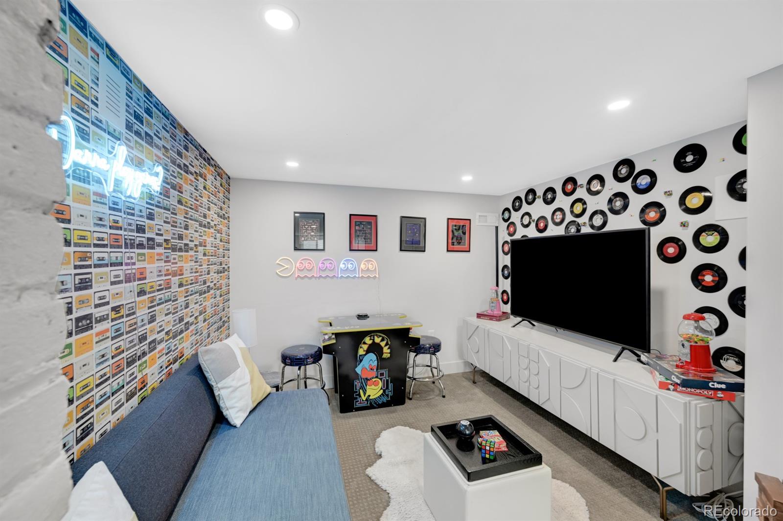 1402 Meade Street Denver, CO 80204 - Photo 14 of 23 a living room with furniture and a flat screen tv