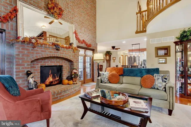 a outdoor living space with furniture and a fireplace