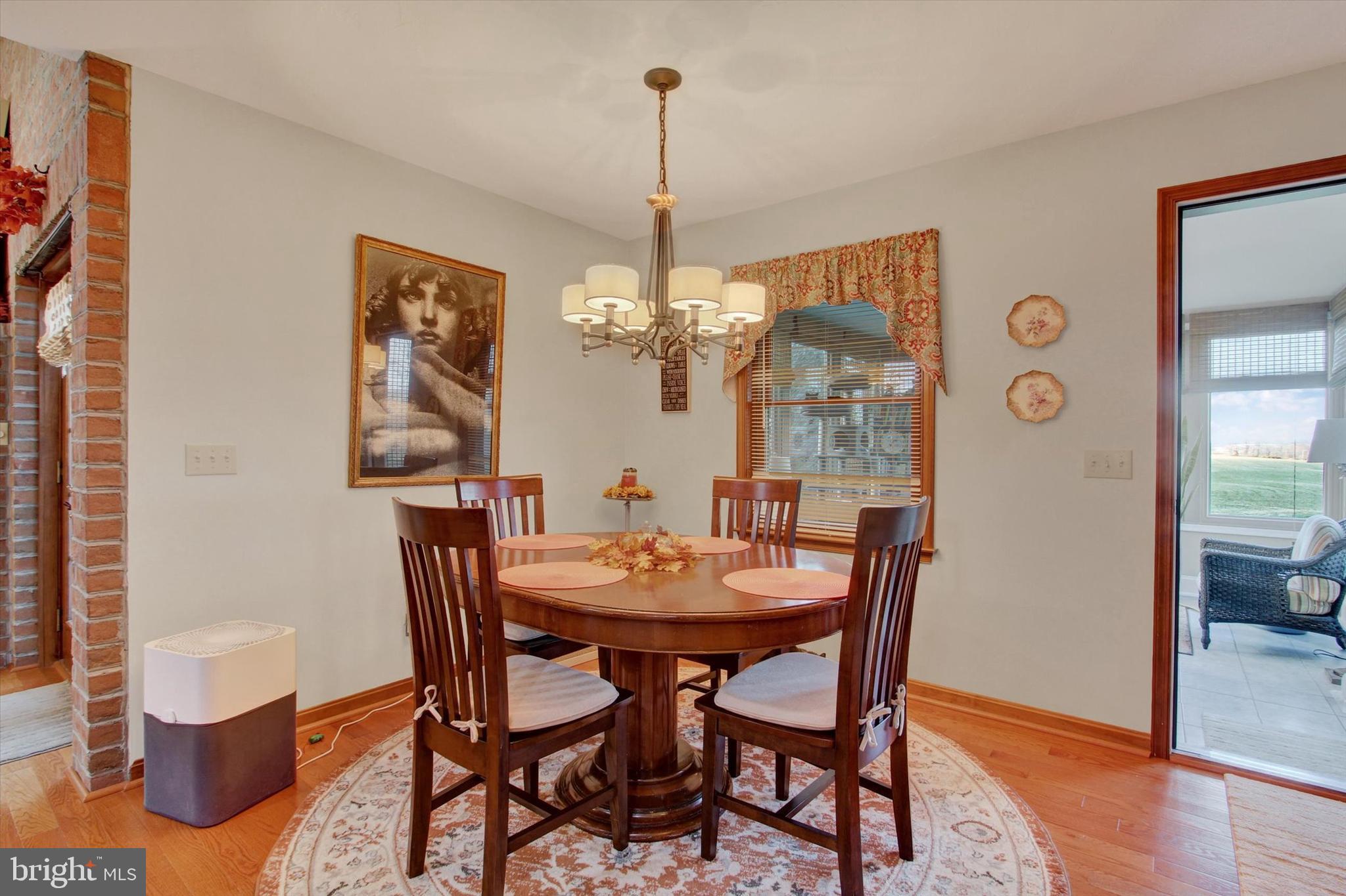 1844 Liberty Road Spring Grove, PA 17362 - Photo 18 of 52 a view of a dining room with furniture window and wooden floor