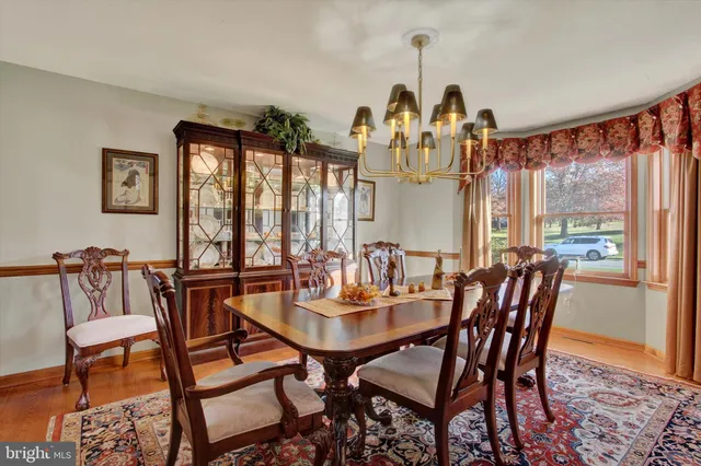 a view of a dining room with furniture