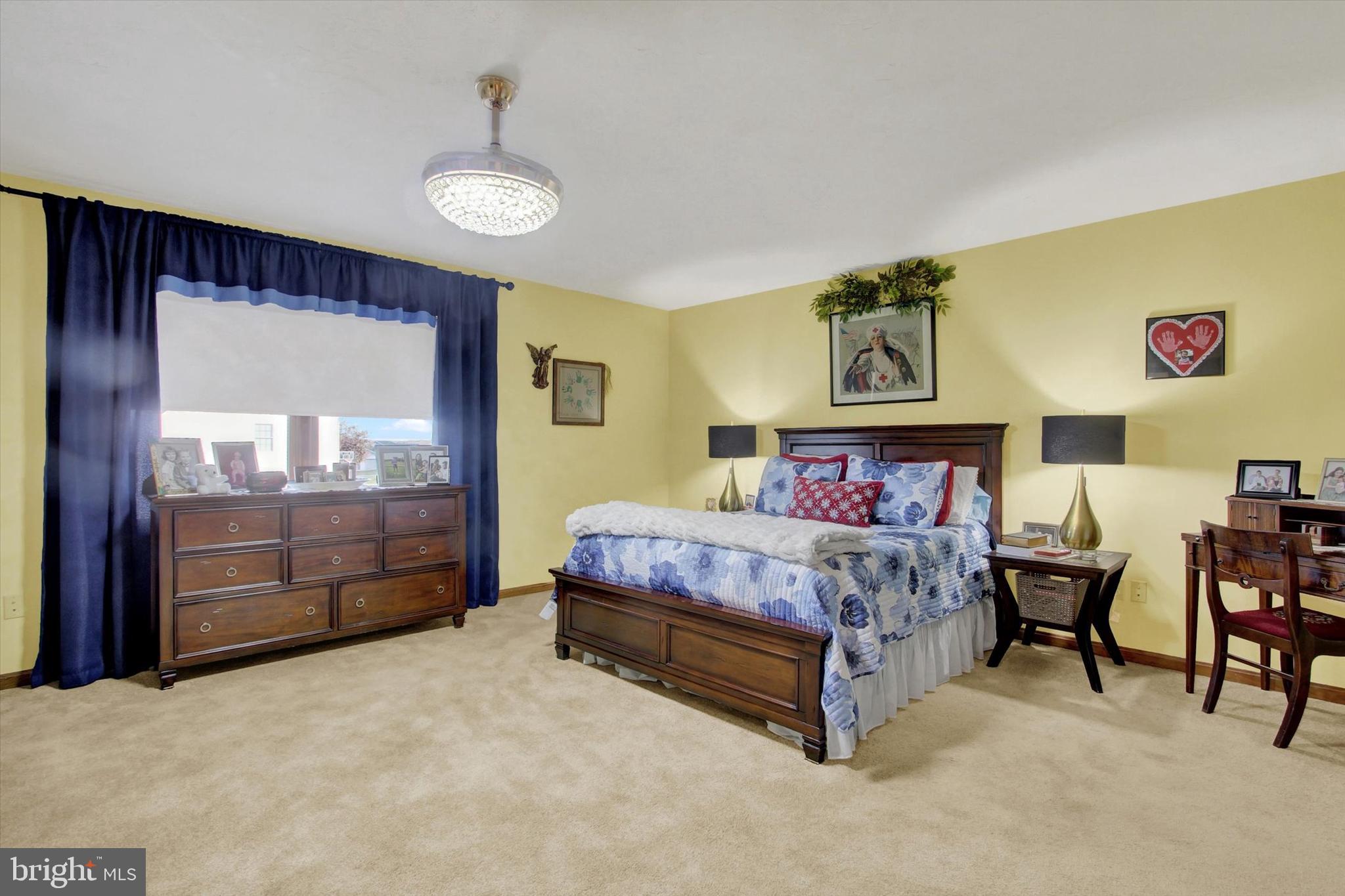 1844 Liberty Road Spring Grove, PA 17362 - Photo 36 of 52 a bed room with a bed and chair