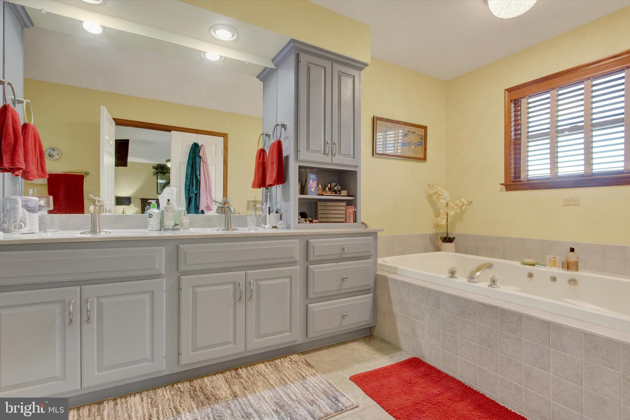 1844 Liberty Road Spring Grove, PA 17362 - Photo 41 of 52 a bathroom with a tub sink and mirror