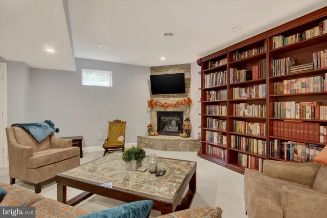 a bathroom with a toilet a sink and a mirror