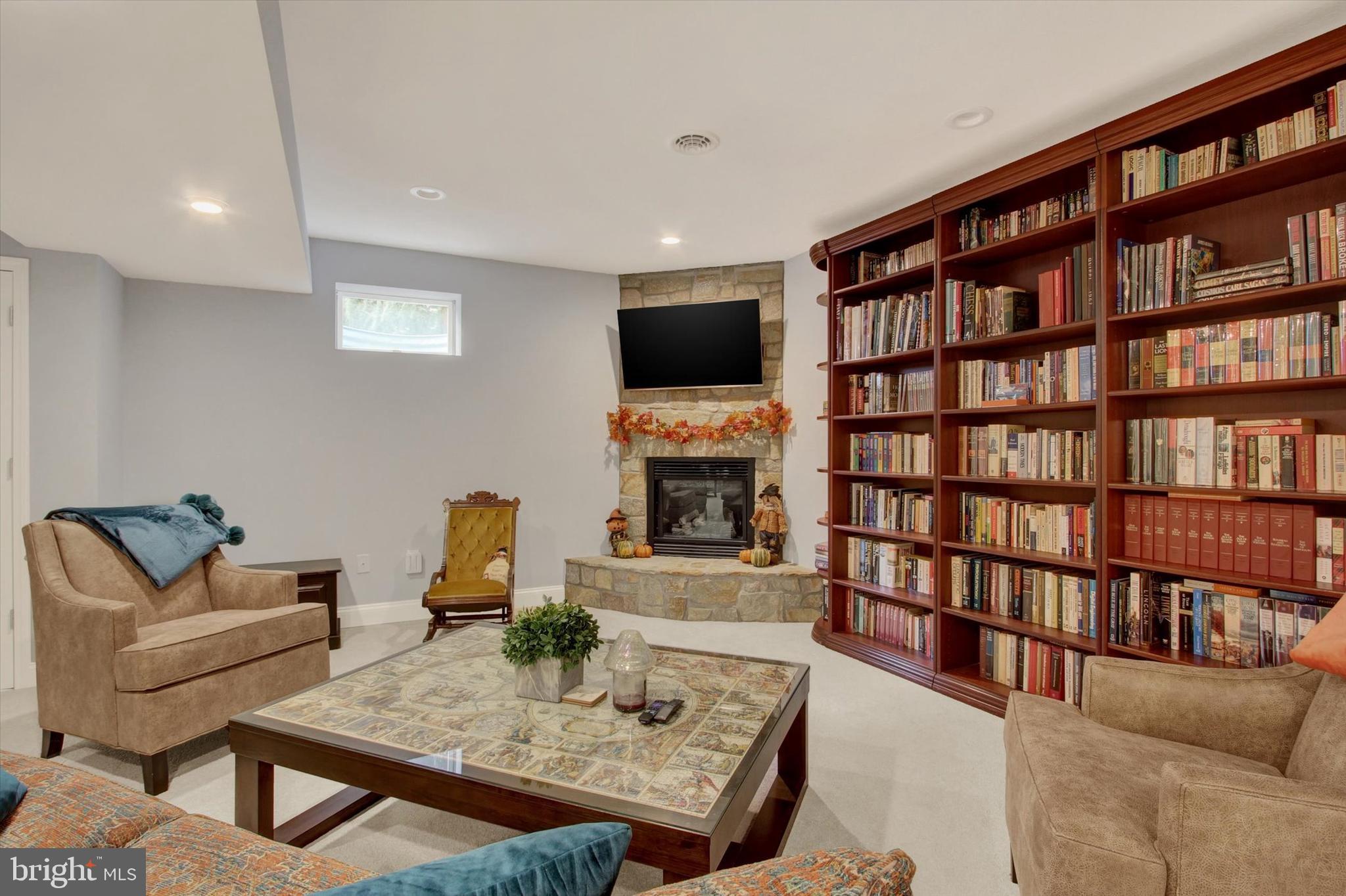 1844 Liberty Road Spring Grove, PA 17362 - Photo 46 of 52 a living room with furniture and a book shelf