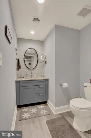 a patio with a garden and plants