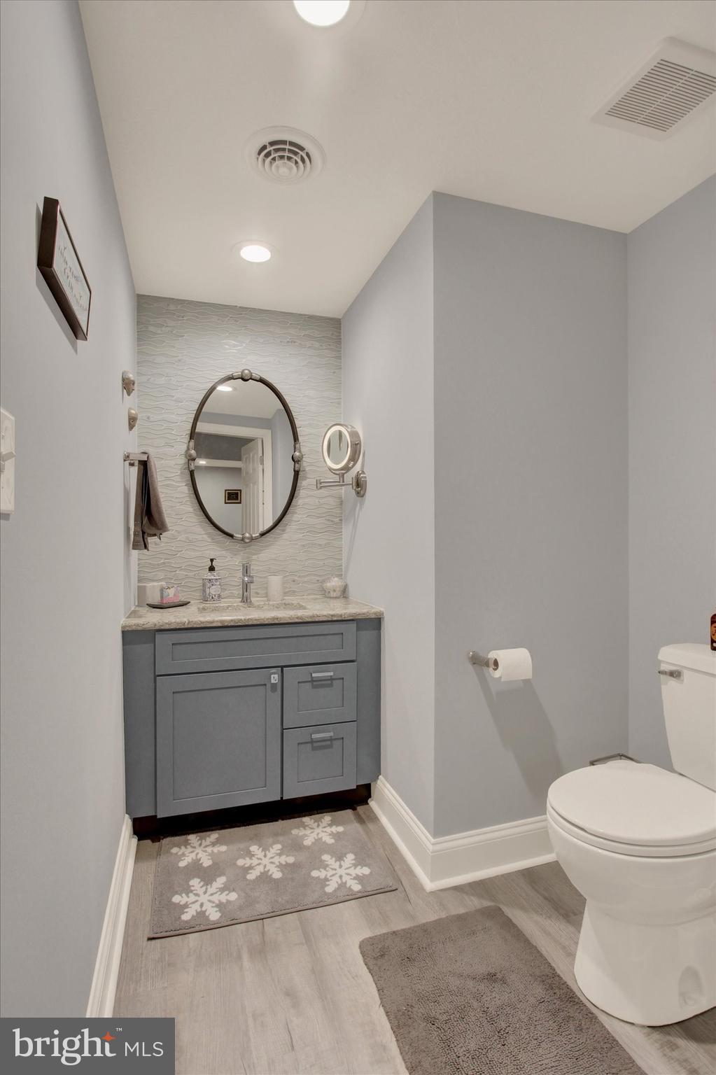 1844 Liberty Road Spring Grove, PA 17362 - Photo 48 of 52 a bathroom with a toilet a sink and a mirror