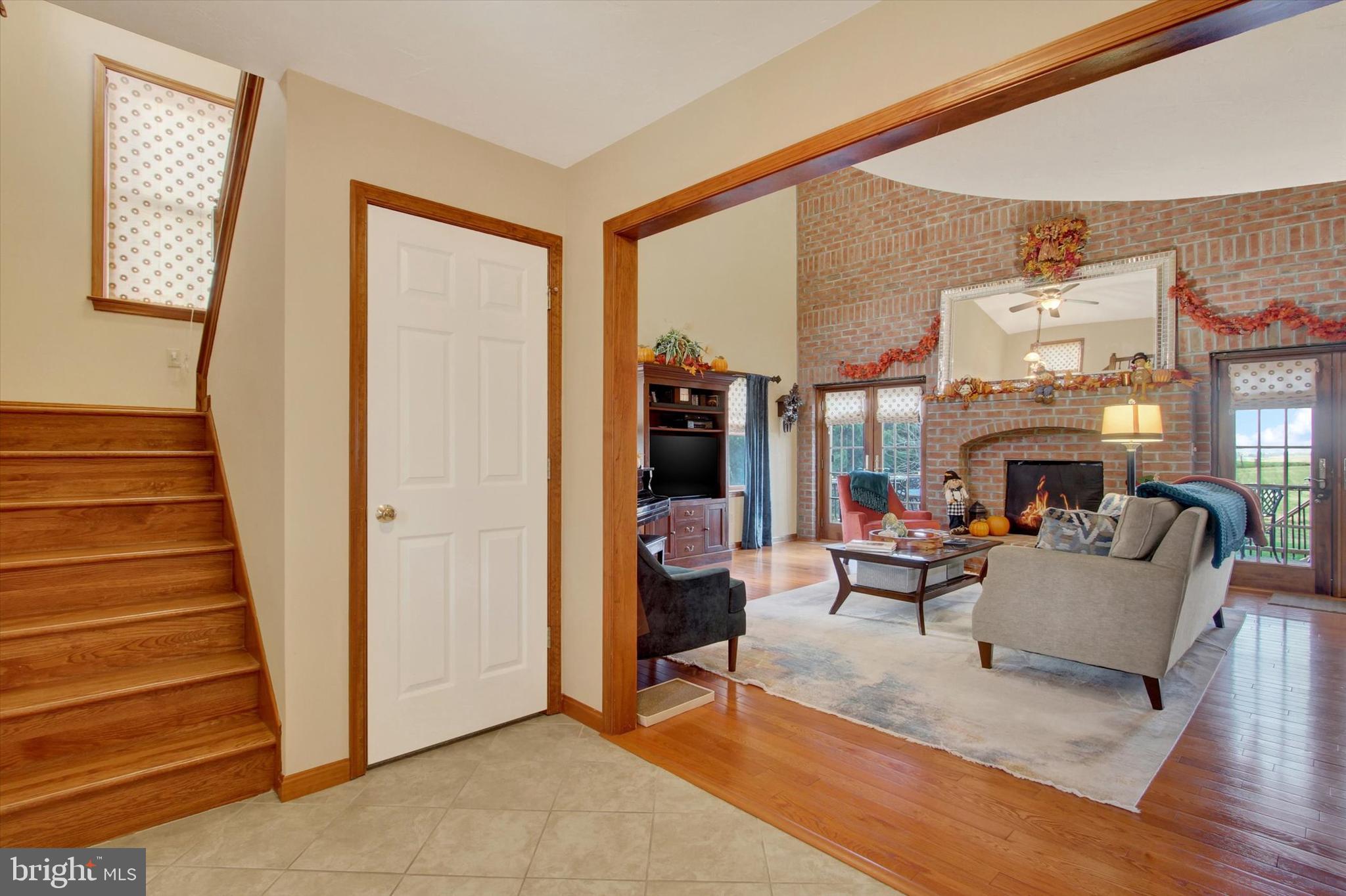 1844 Liberty Road Spring Grove, PA 17362 - Photo 7 of 52 a living room with furniture a fireplace and a large window
