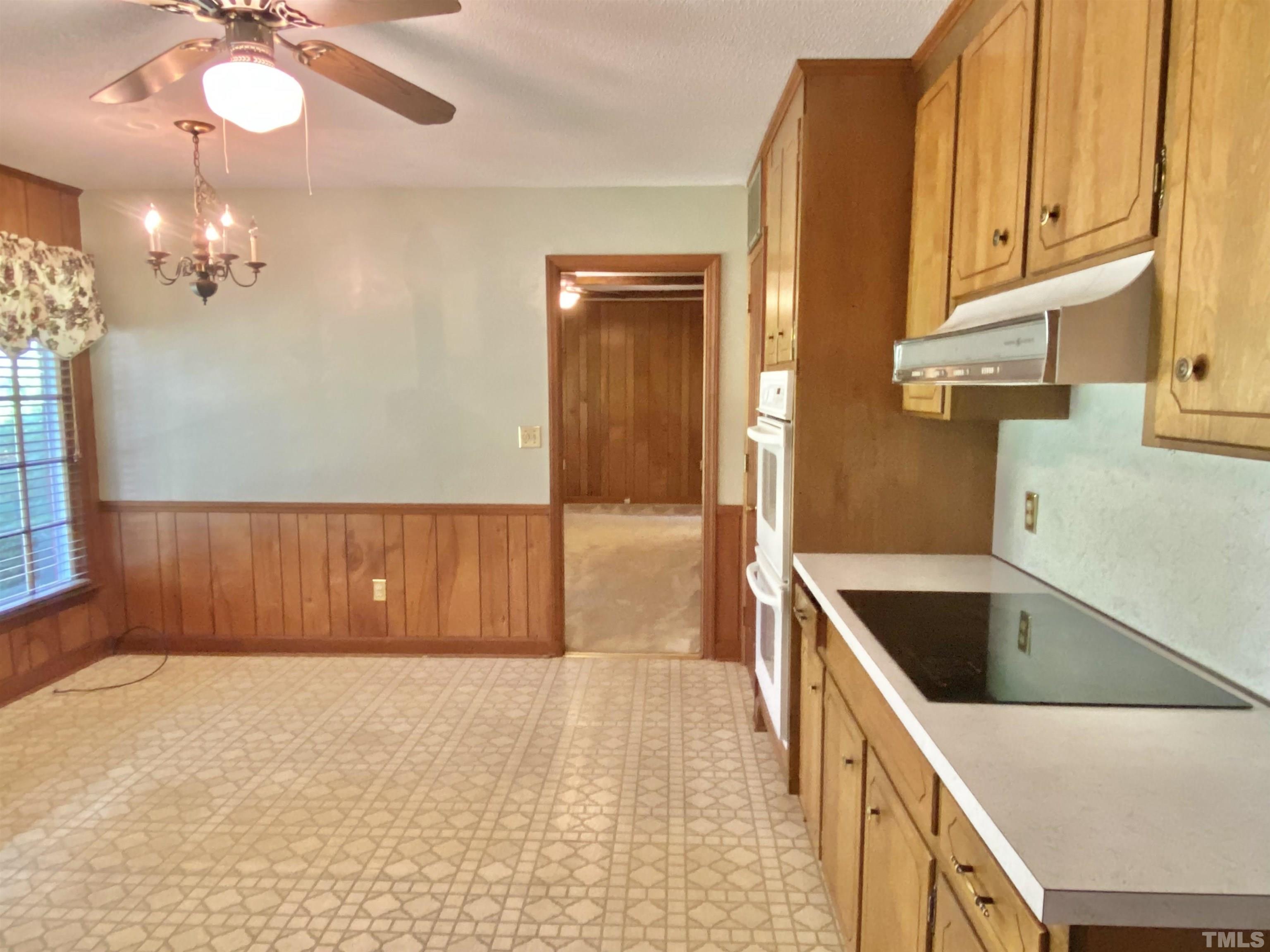 1733 Pearces Road Zebulon, NC 27597 - Photo 22 of 22 a view of a kitchen with a sink and cabinets