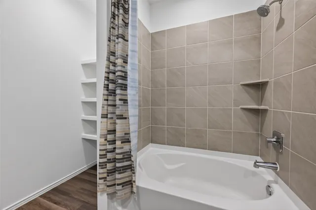 a bathroom with a bathtub