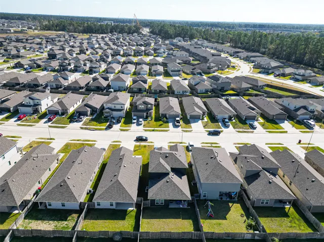 a view of swimming pool with outdoor seating and yard