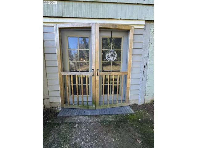 a view of a house with porch and wooden floor