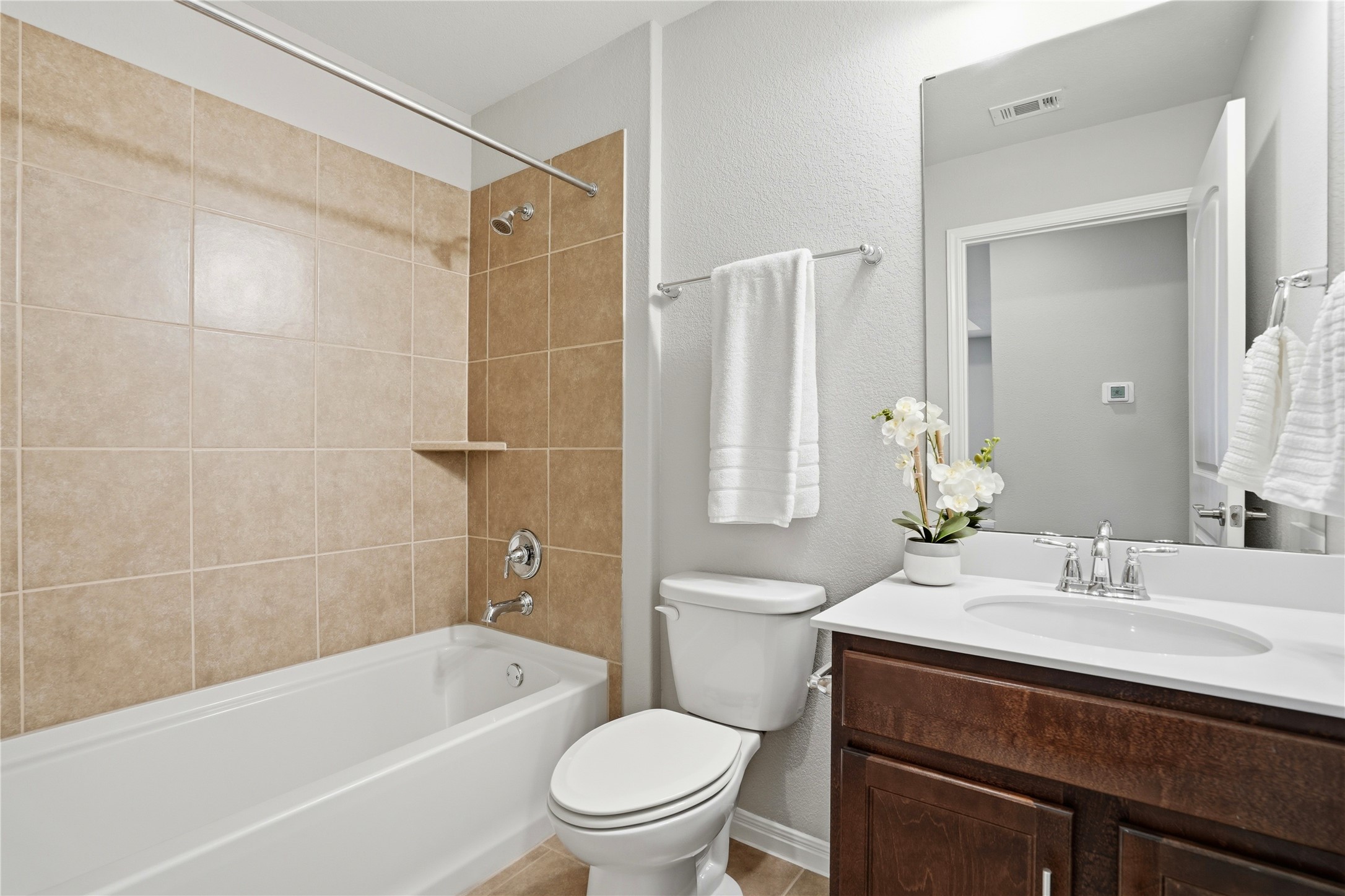 821 Hamilton Lane Georgetown, TX 78633 - Photo 19 of 38 Bathroom featuring a tub/shower combo perfect for guests