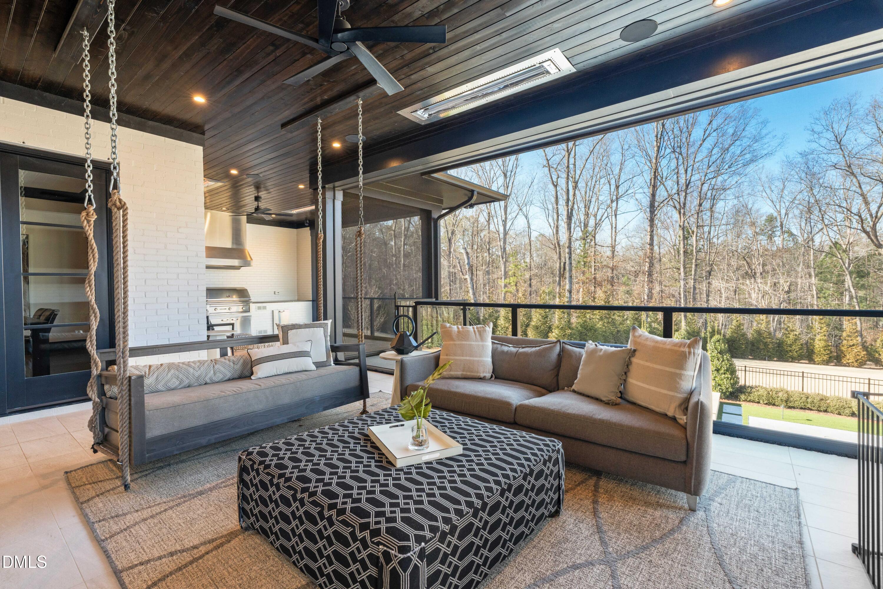 6508 Century Oak Court Raleigh, NC 27613 - Photo 20 of 91 a living room with furniture and a large window