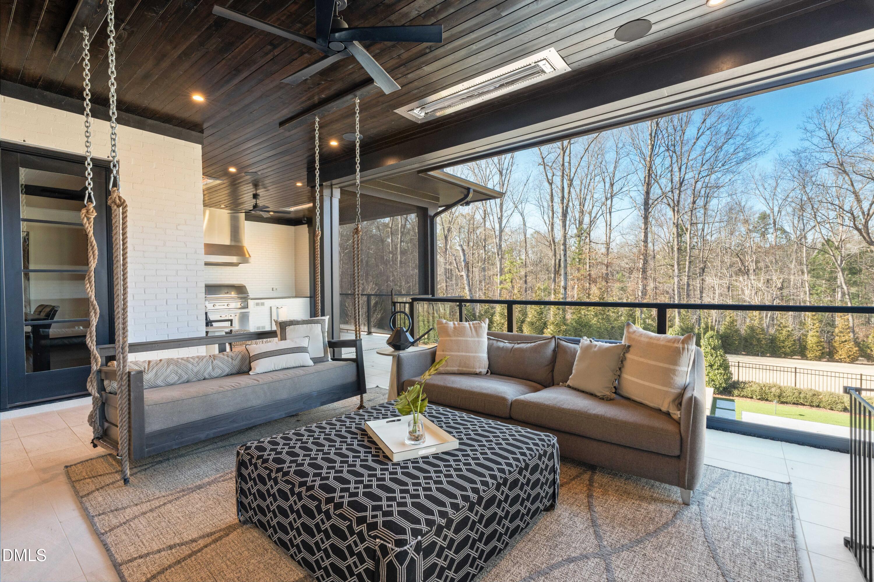6508 Century Oak Court Raleigh, NC 27613 - Photo 22 of 91 a living room with furniture and a large window